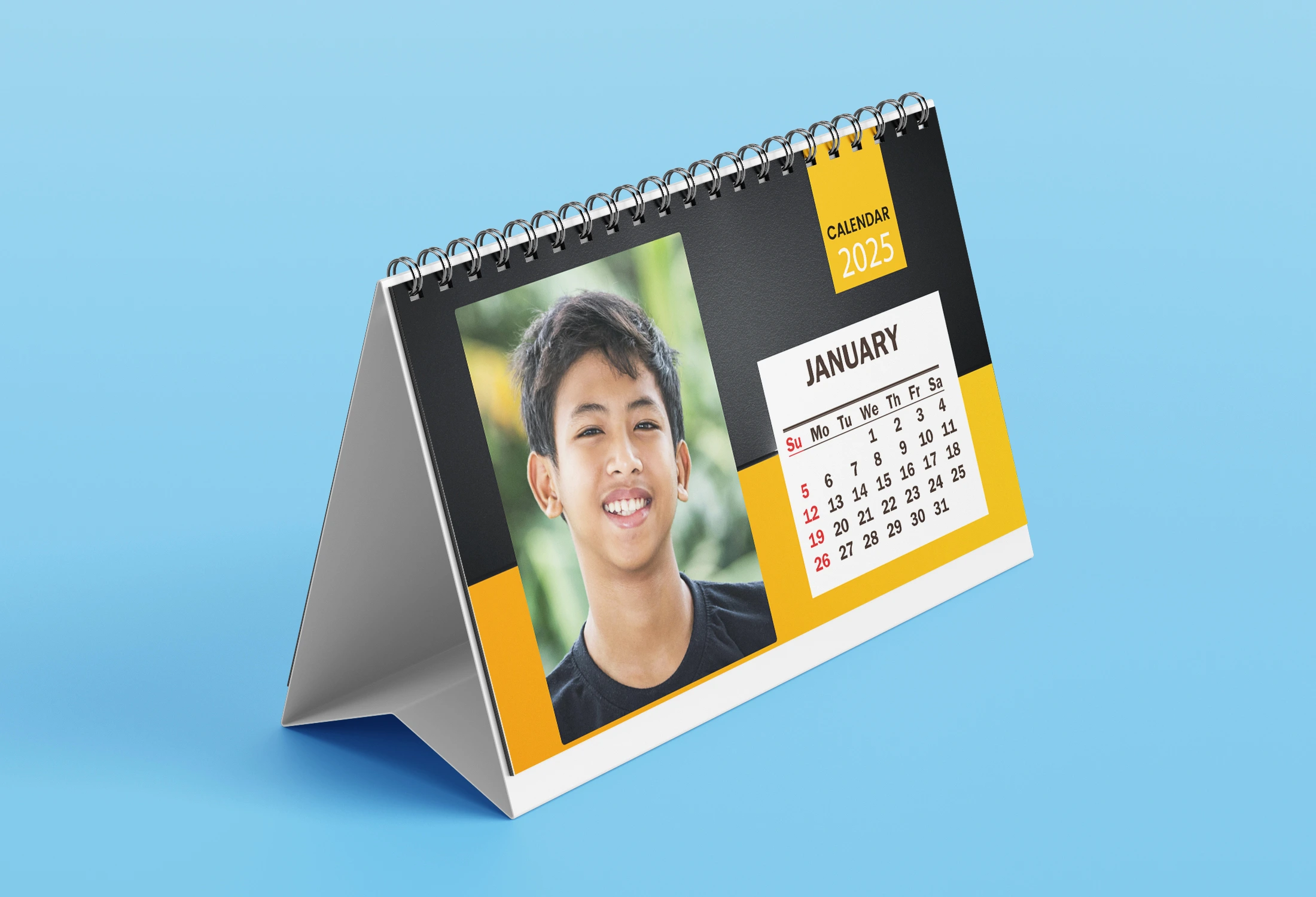 Custom printed calendar with company branding and vibrant monthly design.
