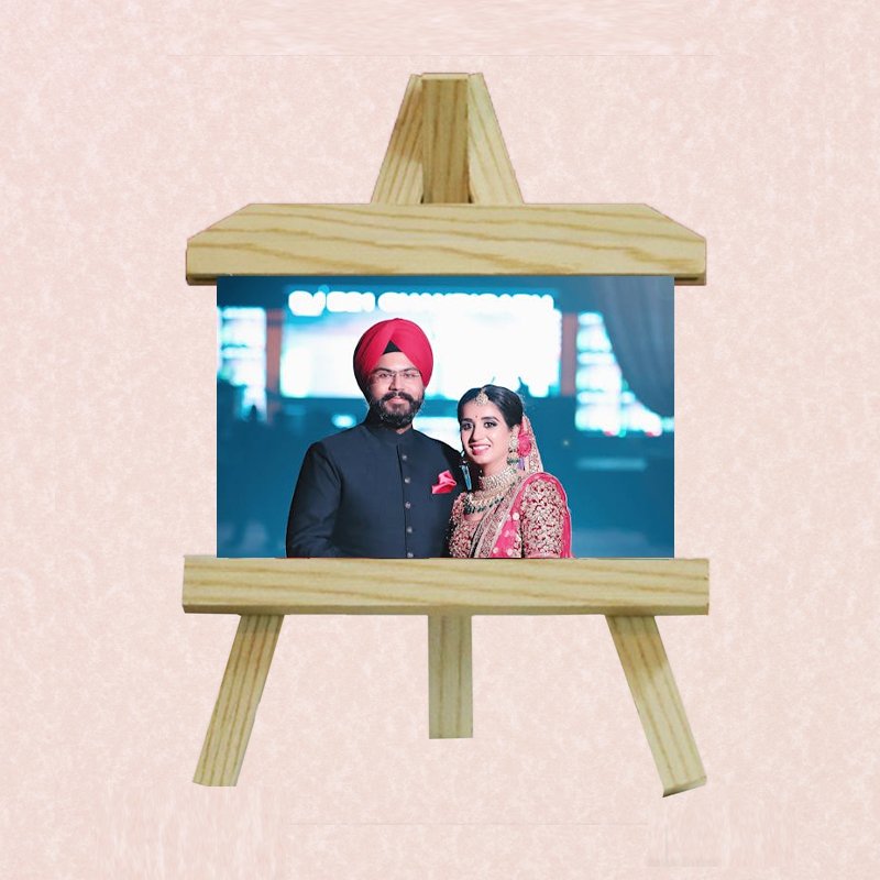 Premium wooden easel stand for artwork and photo display with adjustable height.
