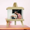 Premium wooden easel stand for artwork and photo display with adjustable height.