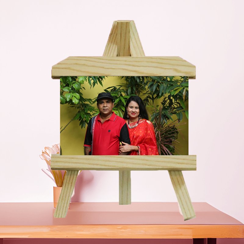 Premium wooden easel stand for artwork and photo display with adjustable height.