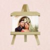 Premium wooden easel stand for artwork and photo display with adjustable height.