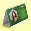 Custom printed calendar with company branding and vibrant monthly design.
