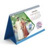 Custom printed calendar with company branding and vibrant monthly design.