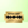 “Barber shop logo designed on a golden razor blade icon with bold text ‘BARBER SHOP’ and the tagline ‘The Best Solution of Hair Cut’.”