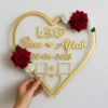 Heart-shaped customized nameplate with red and white roses, couple names "Sina & Aftab"