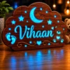 Customized wooden baby night glow nameplate with moon stars teddy and blue glowing resin design